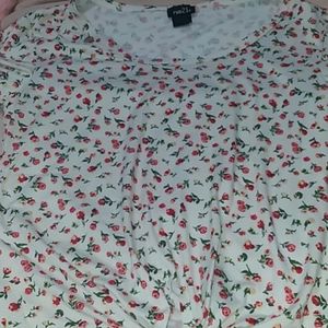 Cute cream top with flower patterns